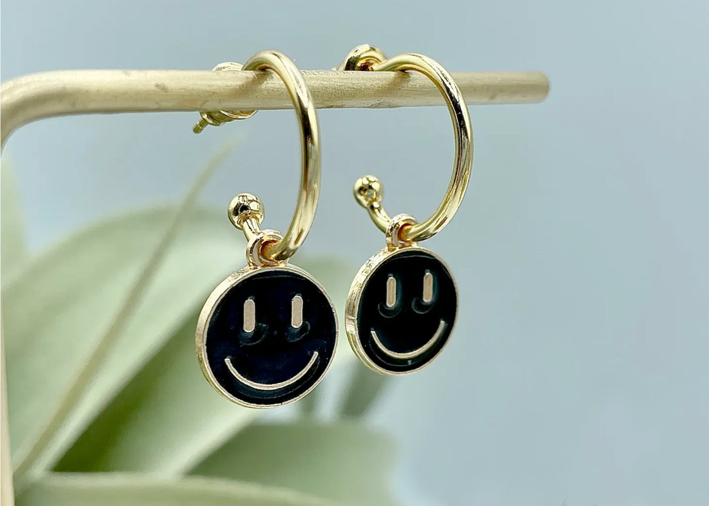Smiley Huggy Hoop Earrings in Black