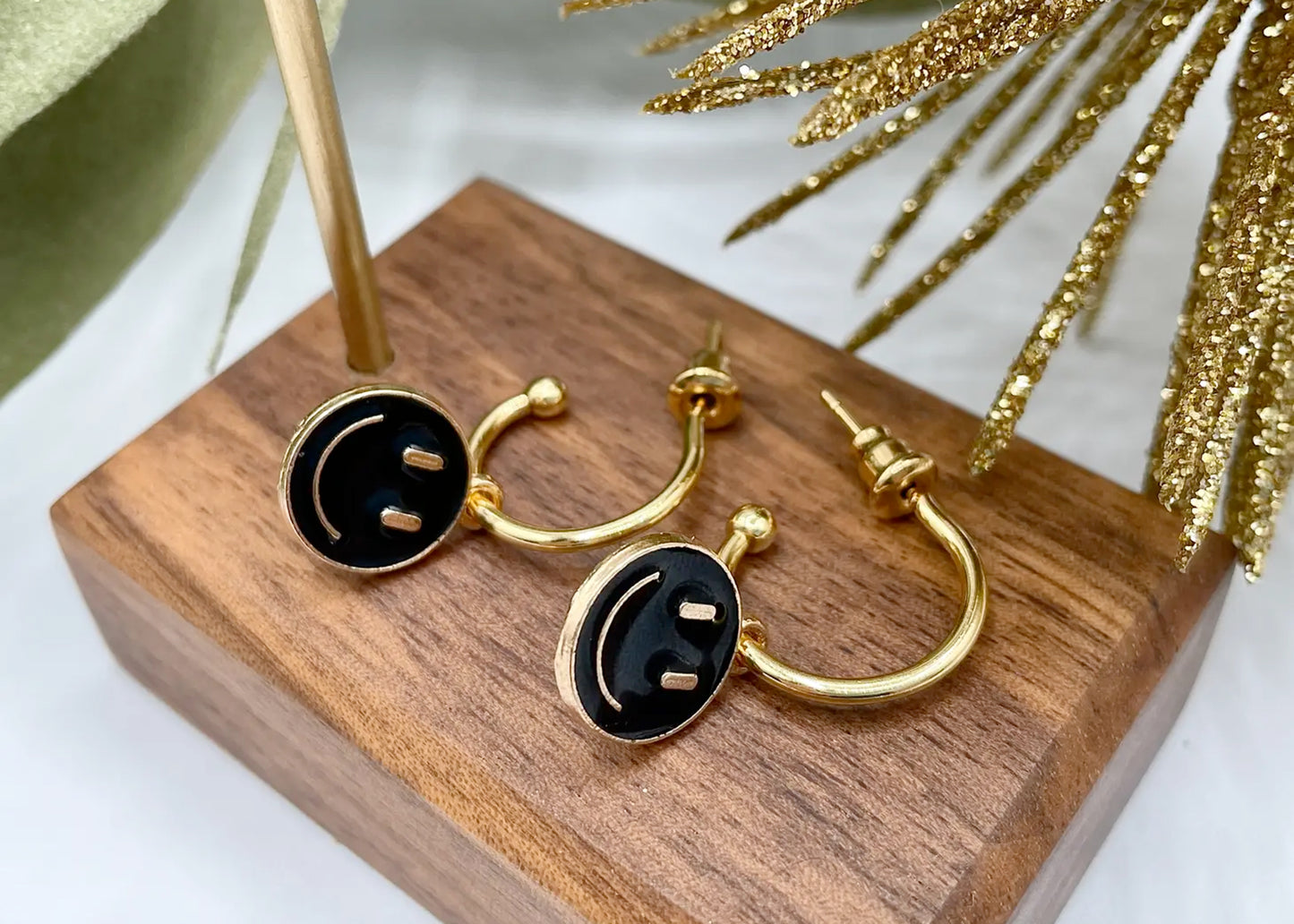 Smiley Huggy Hoop Earrings in Black