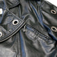 Chia 1980s Black Leather Crop Jacket with Grommeted Sleeves