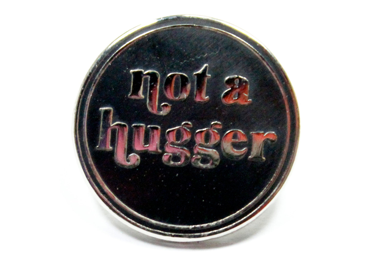 Not A Hugger Enamel Pin in Black